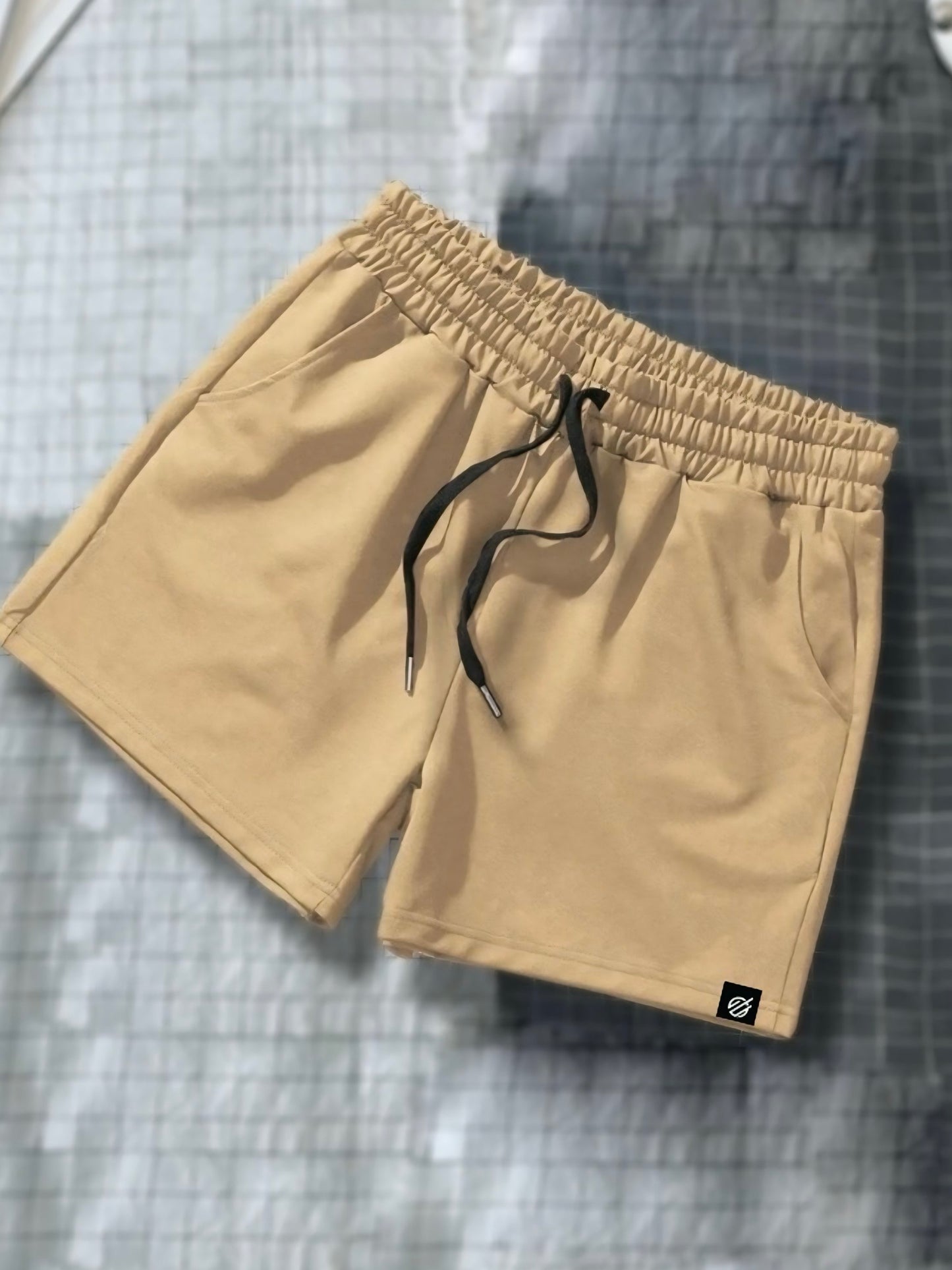 STATEMENT TRAINING SHORTS 2.0 in TAN