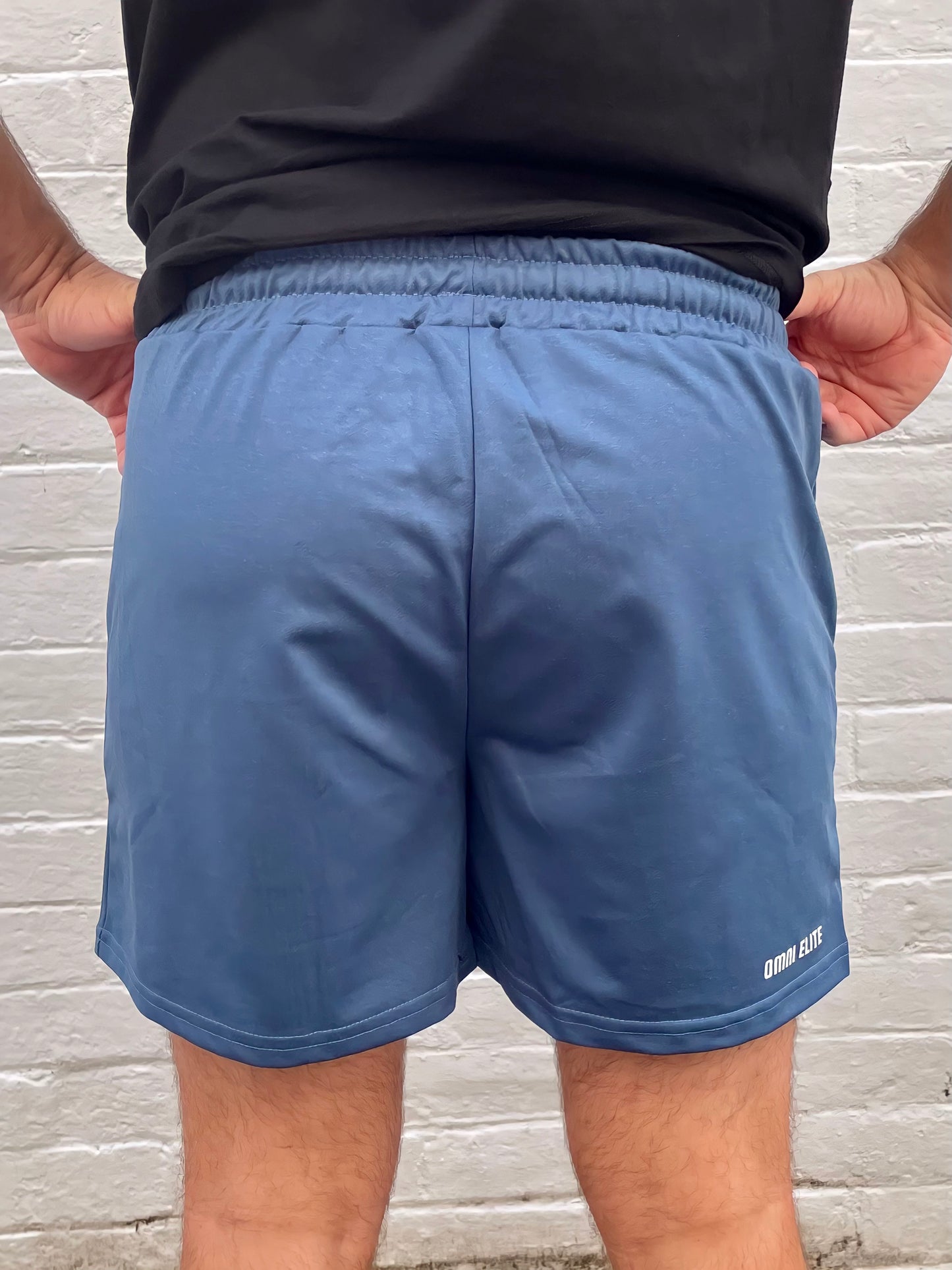 STATEMENT TRAINING SHORT in BOTTLE BLUE